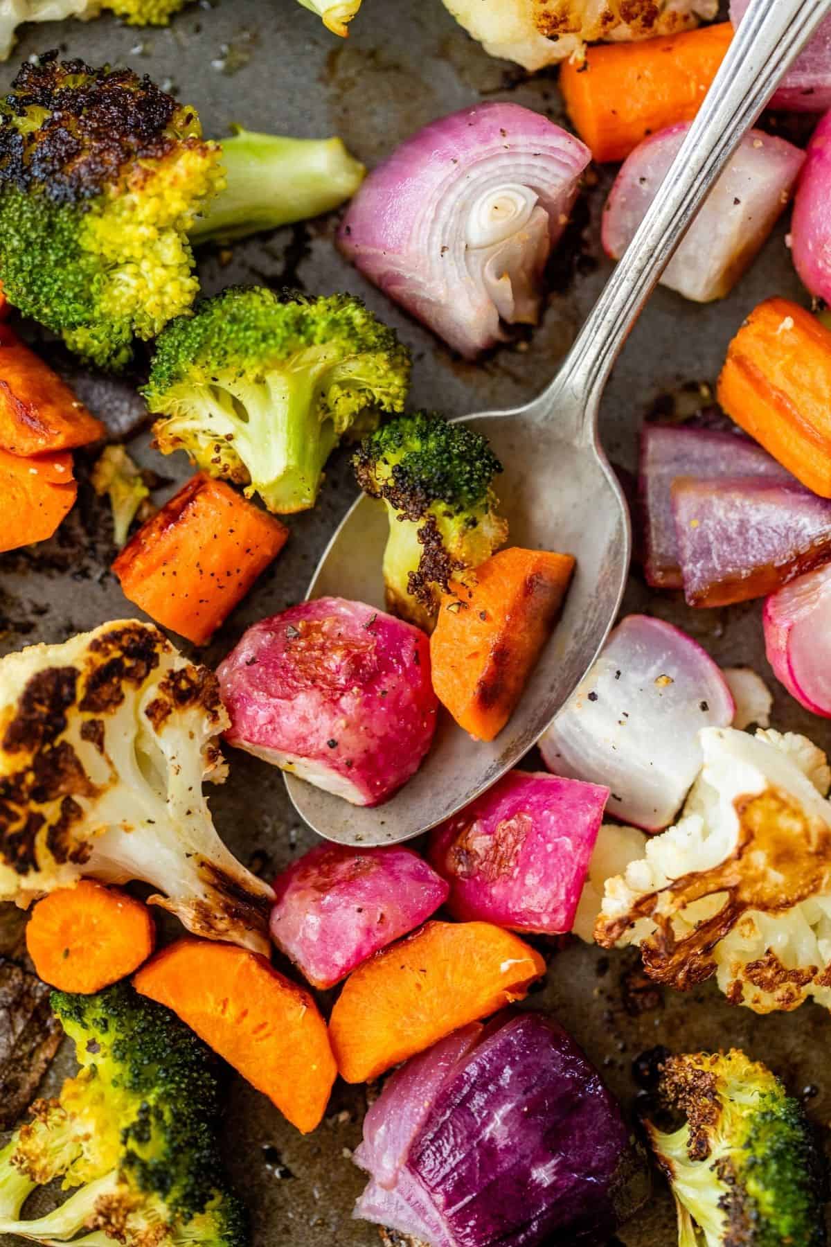 serving roasted vegetable with a spoon