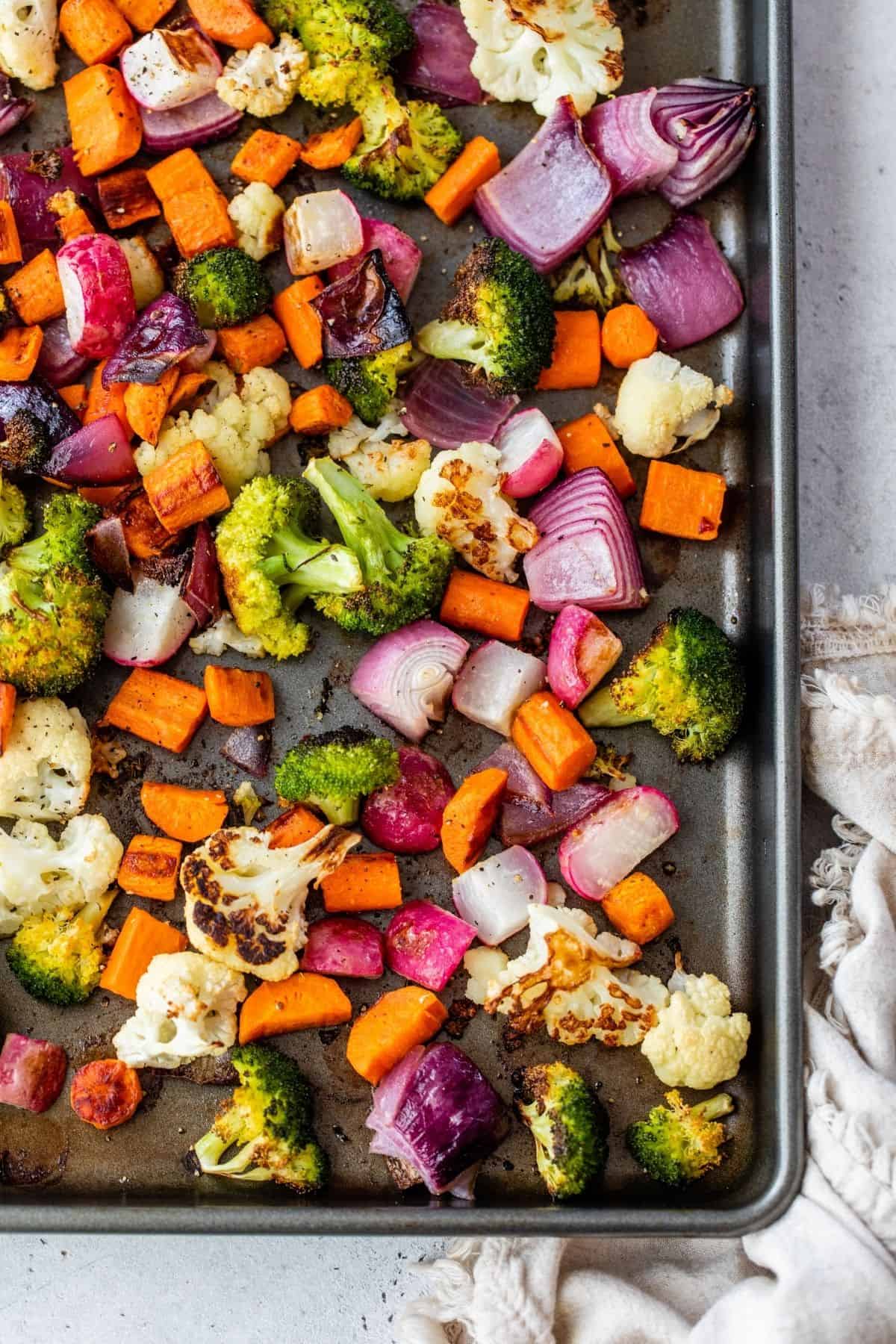 roasted vegetables on a sheet pan