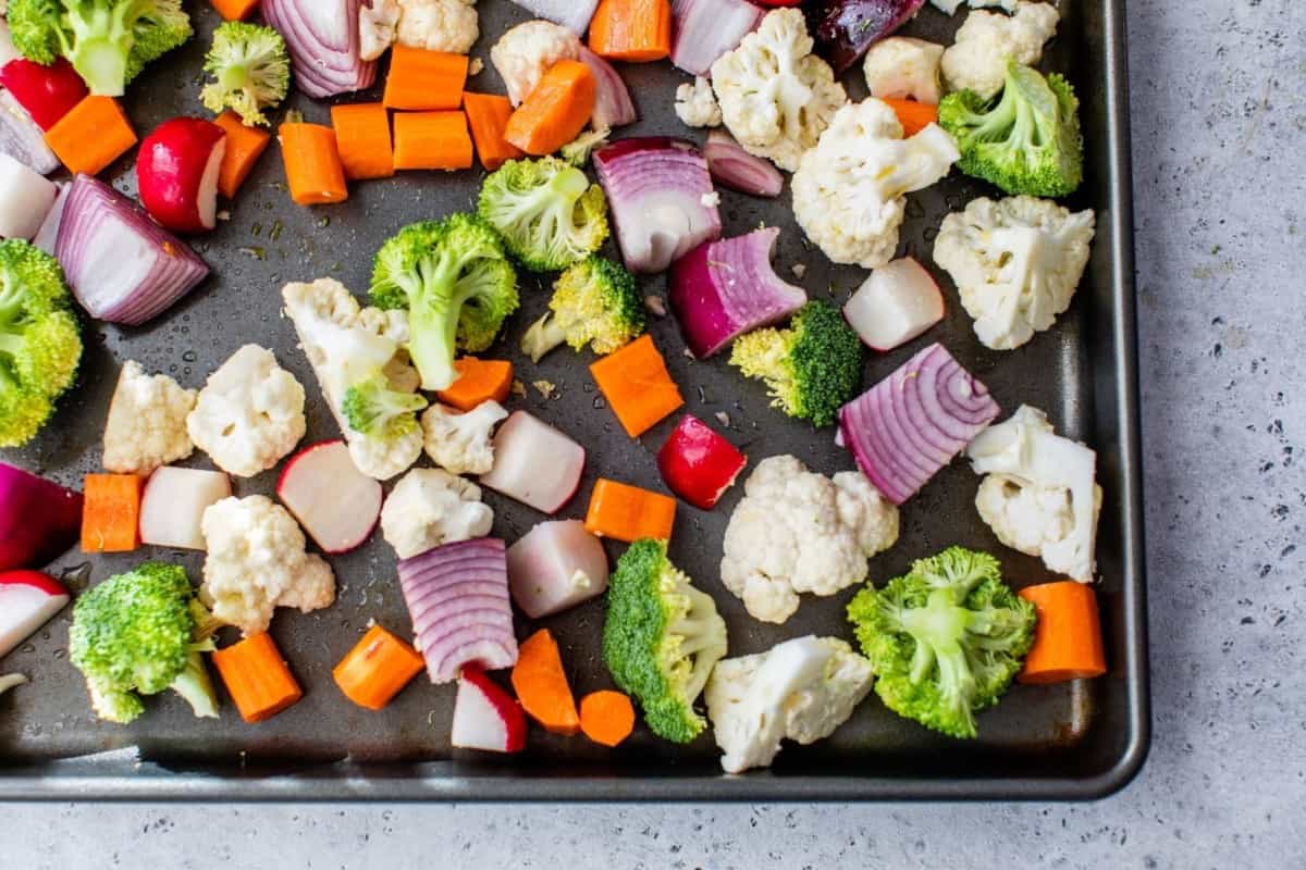 placing veggies on a sheet pan