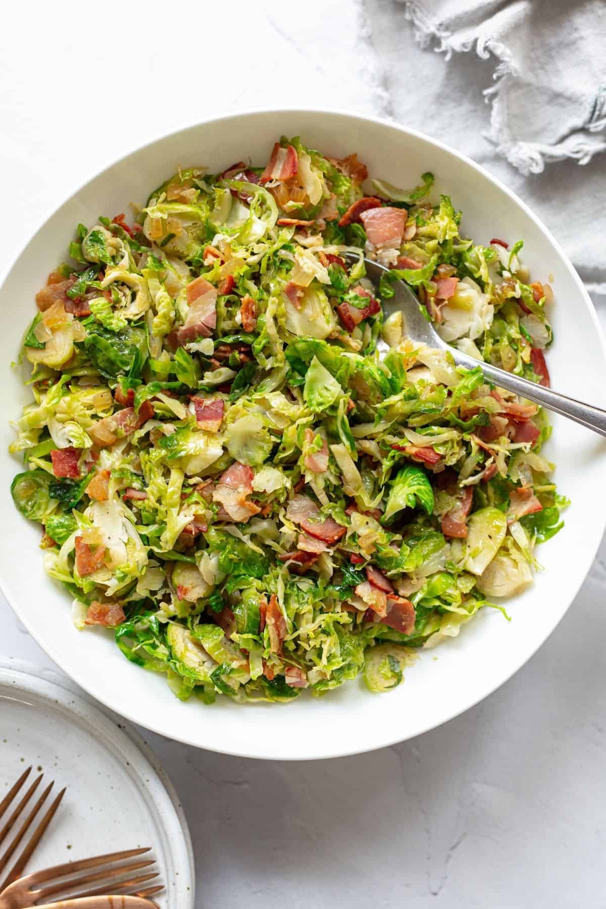 brussels sprouts and pancetta in white bowl
