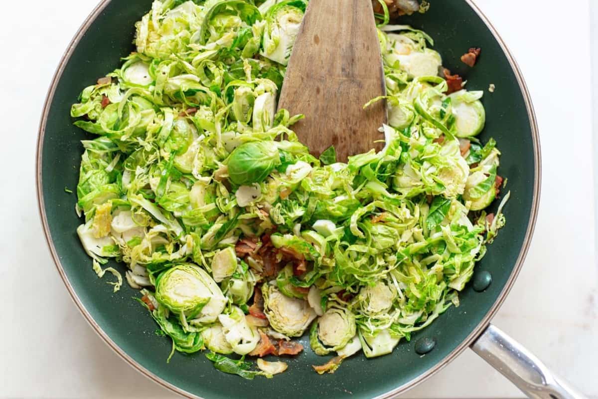 cooking Brussels sprouts in a large skillet