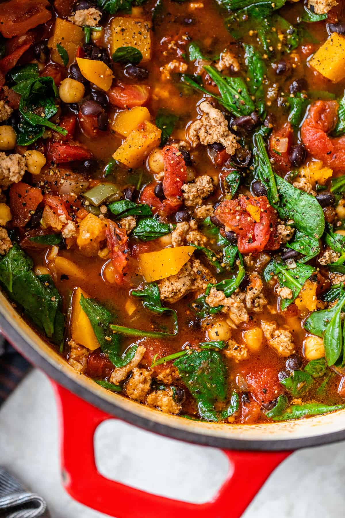 turkey and butternut squash chili in a large red pot