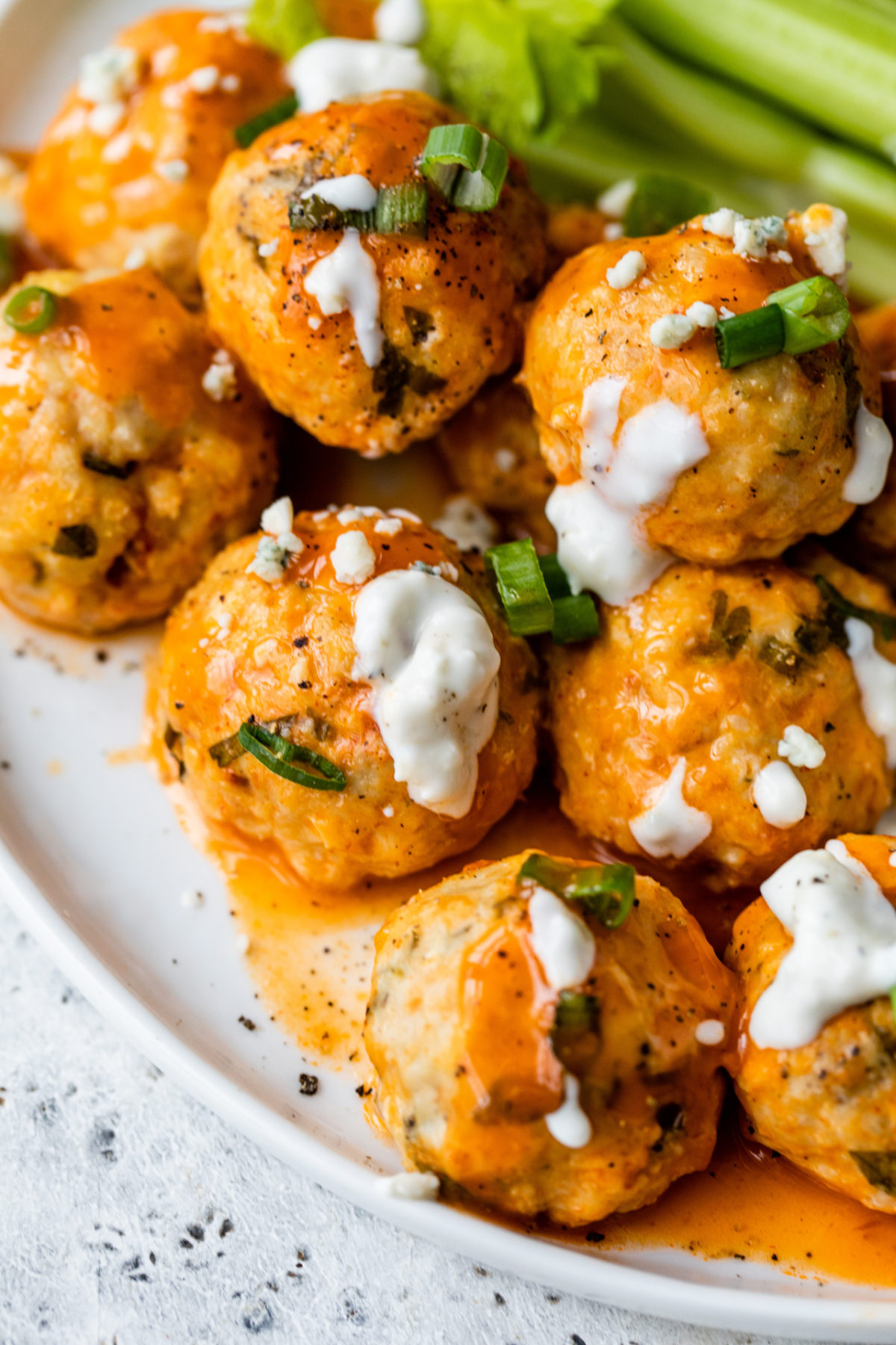 buffalo chicken meatballs topped with blue cheese dressing