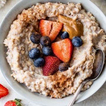 cauliflower oatmeal topped with berries