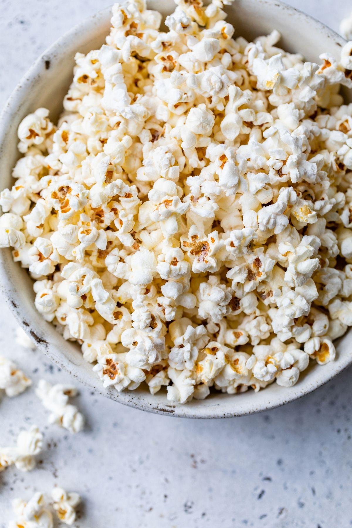 Stovetop popcorn in a white bowl.