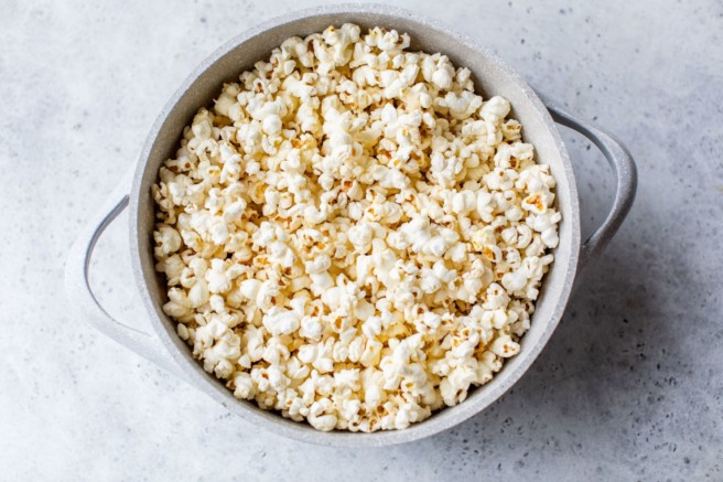 Popped popcorn in a large pot.