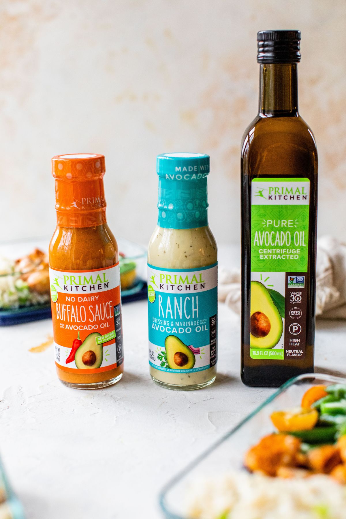 Primal Kitchen brand buffalo sauce, ranch dressing and avocado oil.