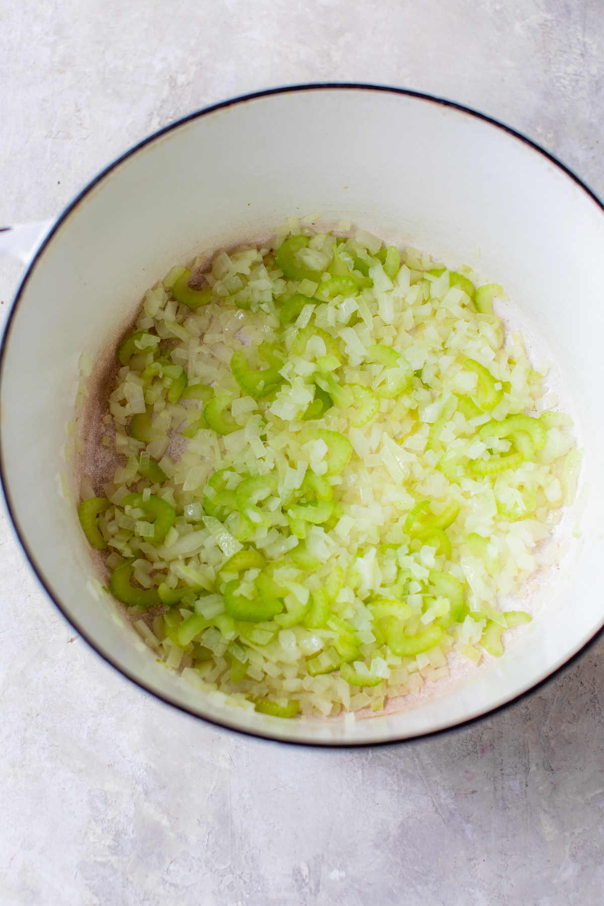 onions, garlic and celery sauted in a white dutch oven