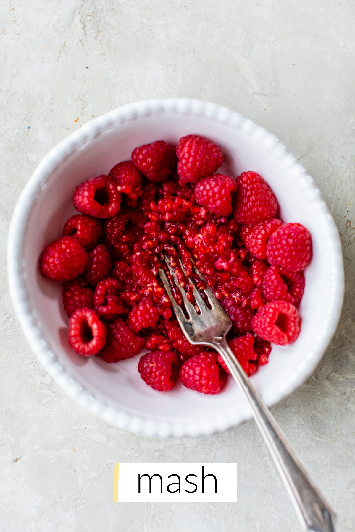 fresh raspberries mashed with a fork