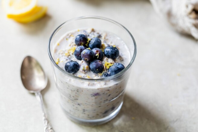 Blueberry lemon overnight oats in a small glass.