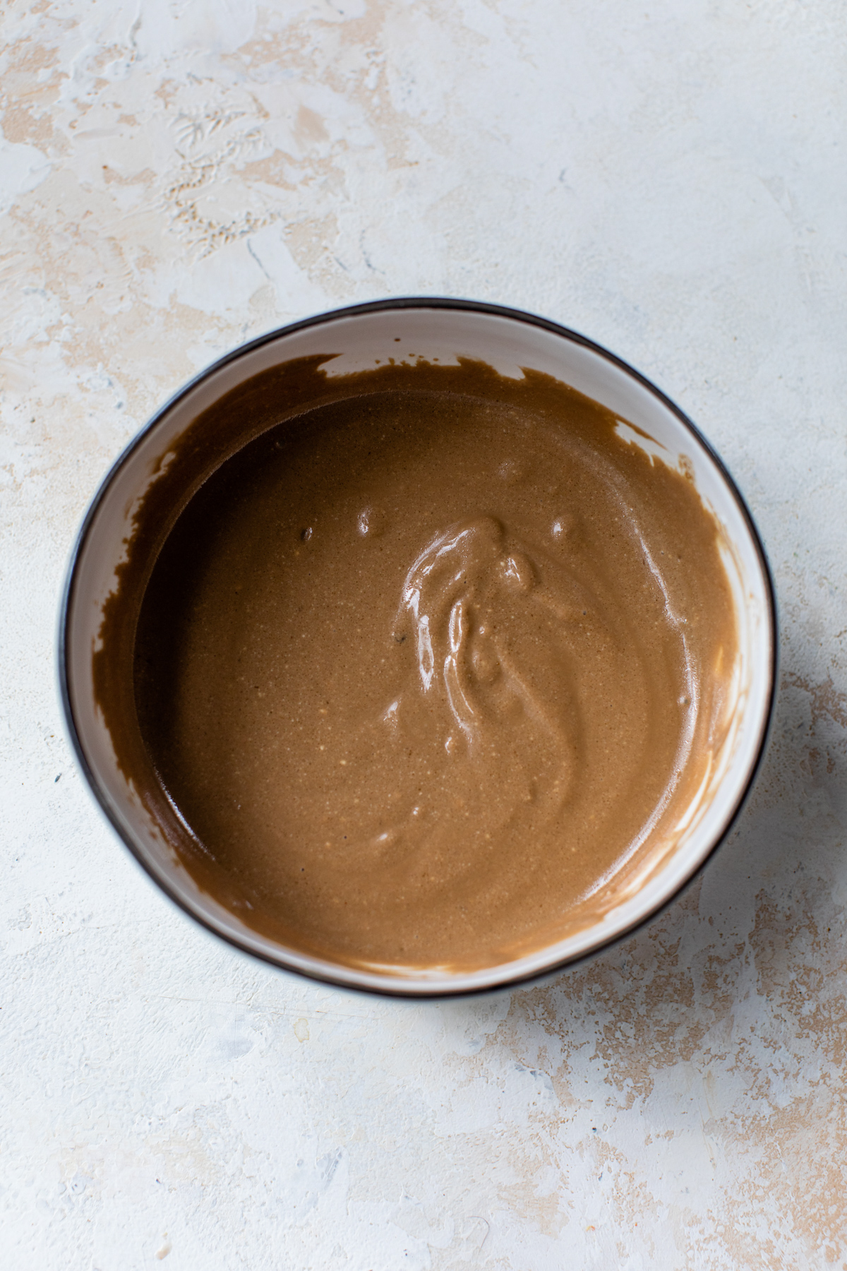 creamy balsamic dressing whisked together in a small bowl