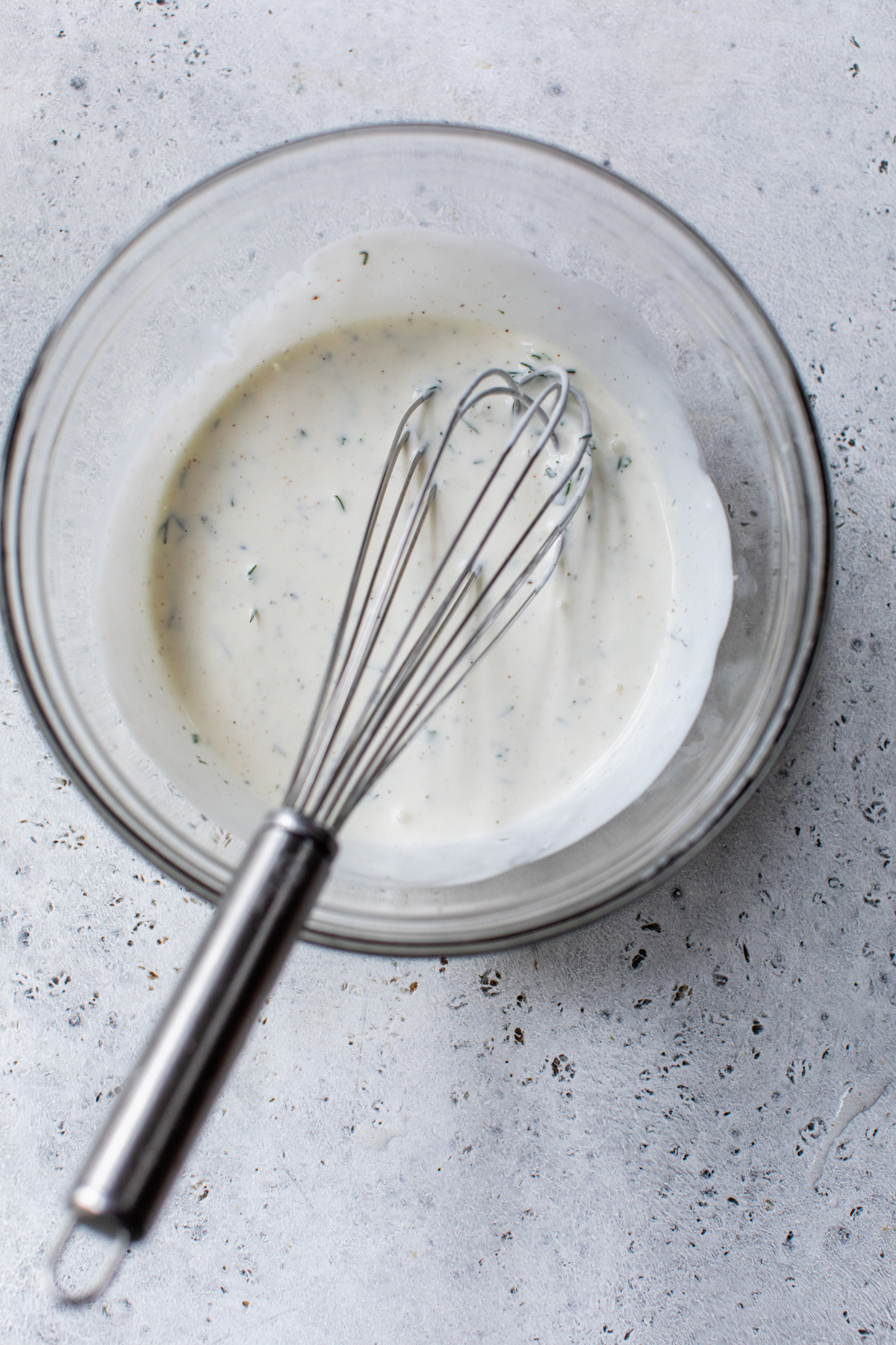 freshly whisked buttermilk ranch dressing in a small bowl