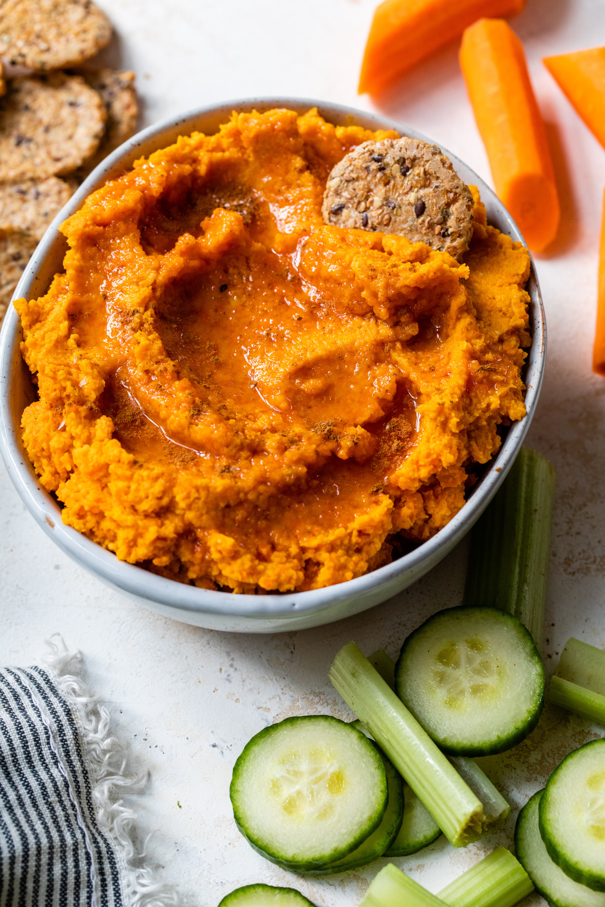 roasted carrot hummus topped with cinnamon and honey