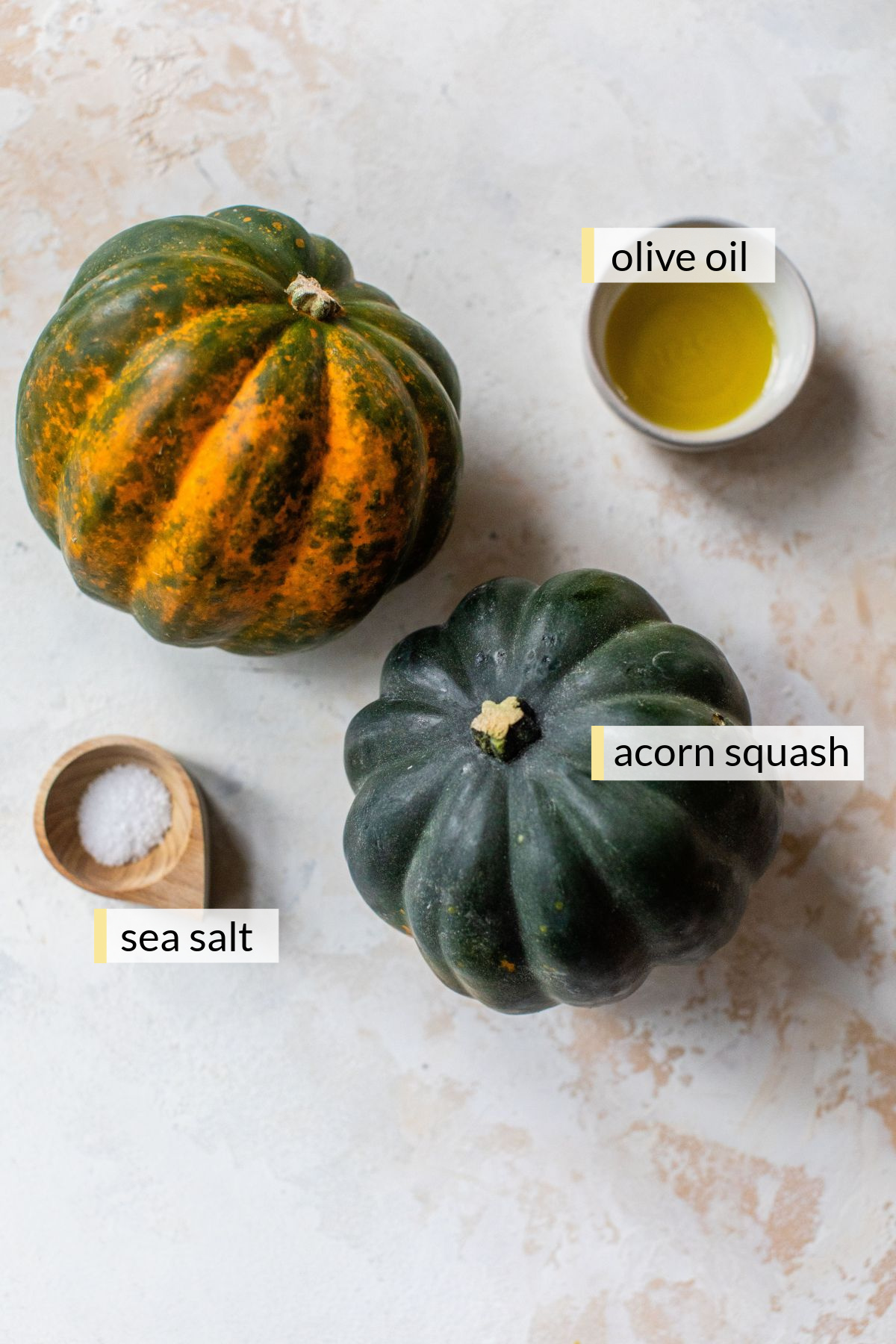 Two acorn squash, sea salt and olive oil.