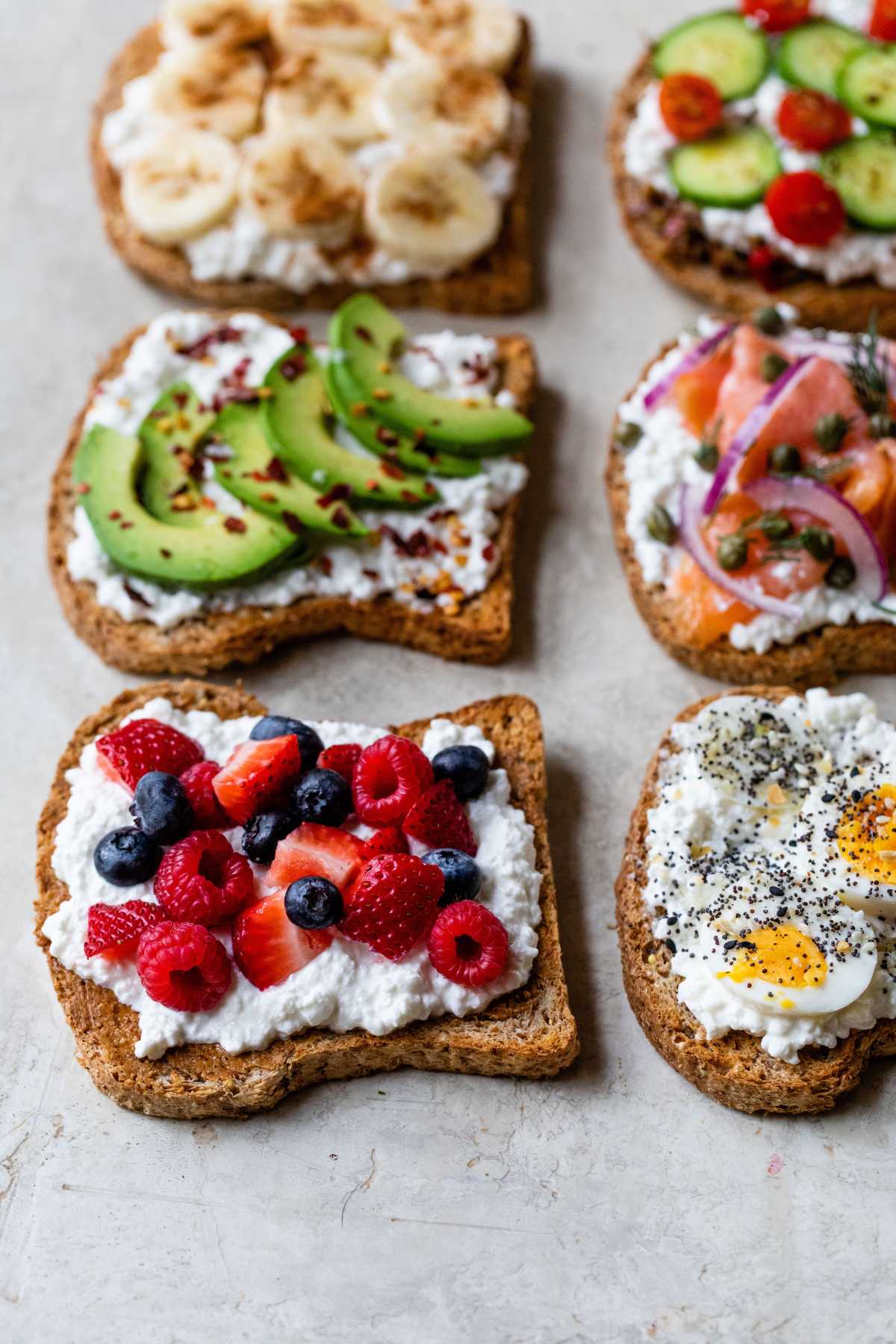 Toasts topped with cottage cheese and various other toppings.