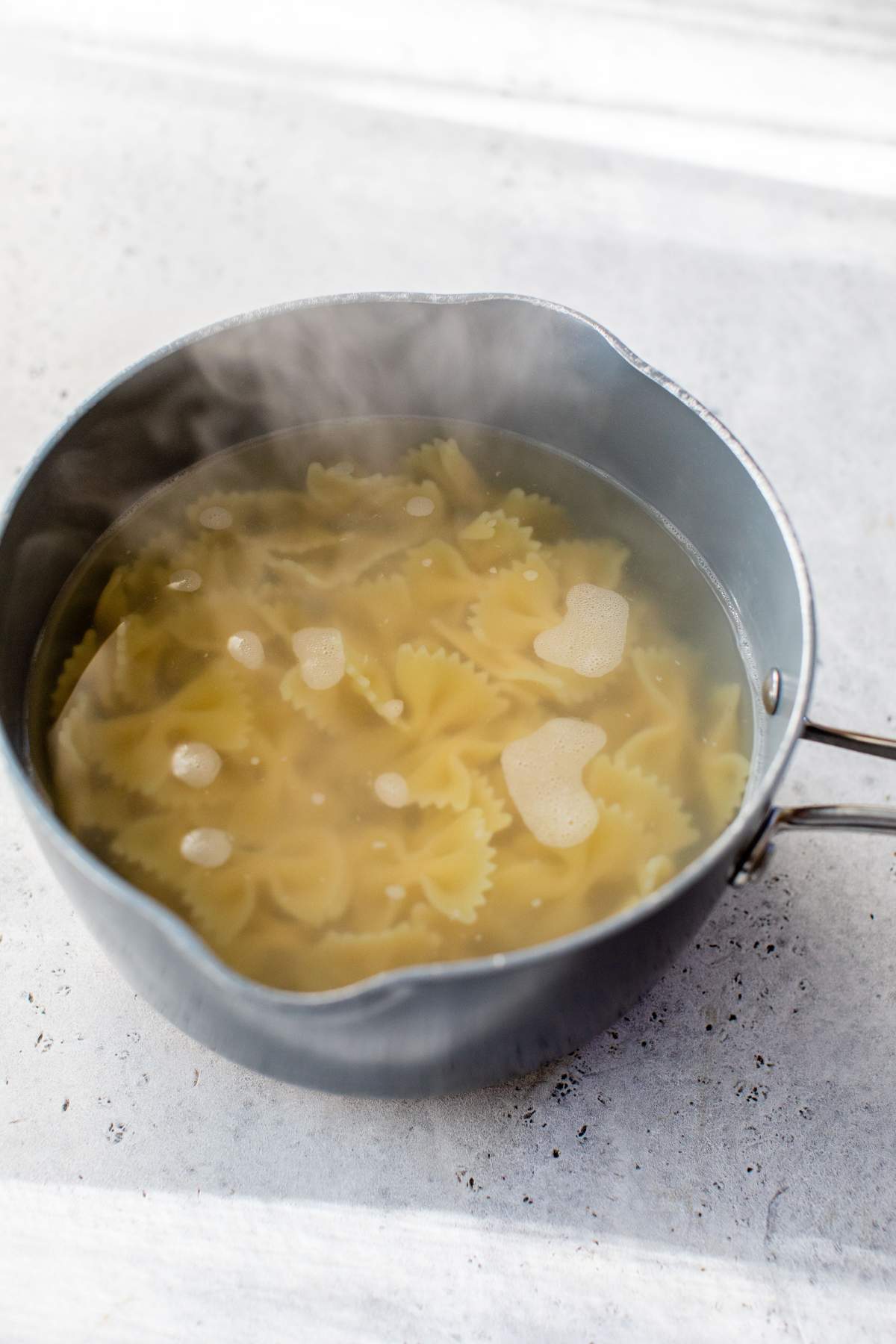 Pasta in a pot with boiling water.