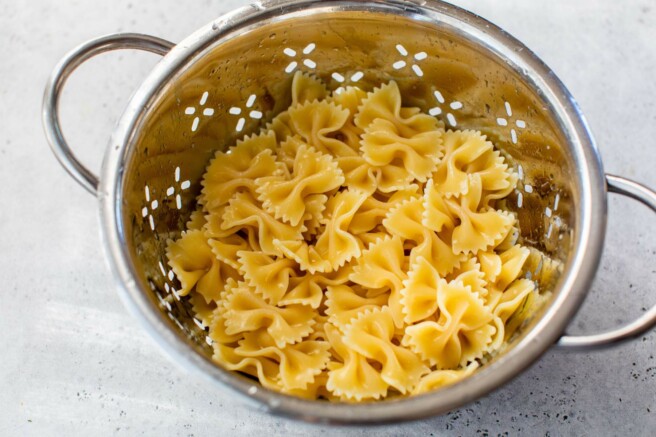 Draining pasta in a colander.